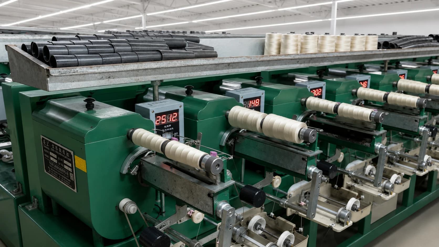 Sewing thread conning machines with digital length counters